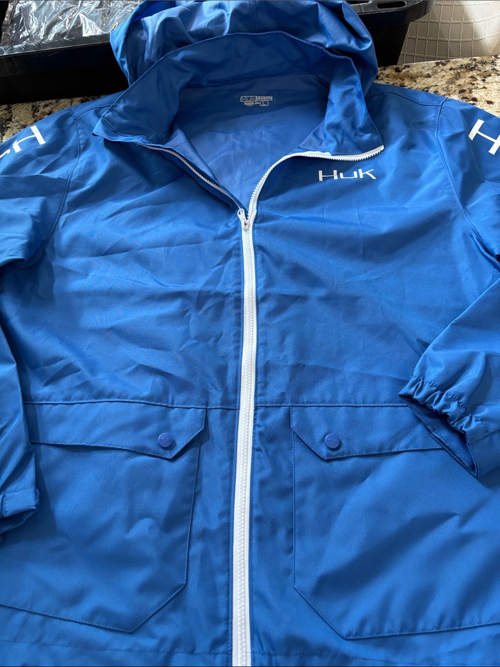 Huk Men’s Blue Hooded Raincoat with White Zip